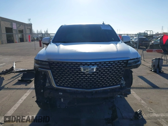2021 Cadillac Escalade ESV Premium Luxury z VIN 1GYS4LKL2MR264645, wystawiony jako IAAI lot #41013027 z przebiegiem 103 454 mil mil oraz . Historia ofert i sprzedaży dostępna na DreamBid. Obrazek 13.