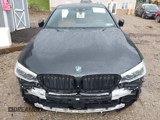 2018 BMW 5 Series M550i xDrive with VIN WBAJB9C5XJB286923, listed as a IAAI auction lot 42527301 with 76,923 mi miles and . Bid and sale history available at DreamBid. Image 12.