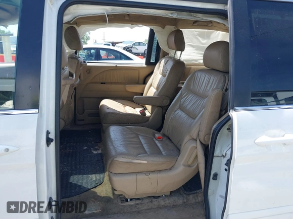 2007 Honda Odyssey EX-L with VIN 5FNRL38617B141003, listed as a IAAI auction lot 39232543 with 195,096 mi miles and . Bid and sale history available at DreamBid. Image 8.
