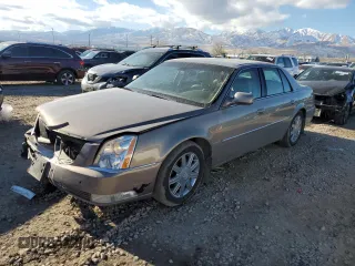 2006 Cadillac DTS 1SC z VIN 1G6KD57Y26U214174, wystawiony jako Copart lot #84074414 z przebiegiem 186 888 mil mil oraz Szkoda całkowita • Salvage title. Historia ofert i sprzedaży dostępna na DreamBid. Obrazek 1.