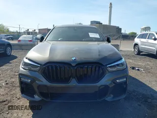 2021 BMW X6 sDrive40i z VIN 5UXCY4C06M9F26841, wystawiony jako IAAI lot #42122749 z przebiegiem 10 072 mil mil oraz . Historia ofert i sprzedaży dostępna na DreamBid. Obrazek 11.