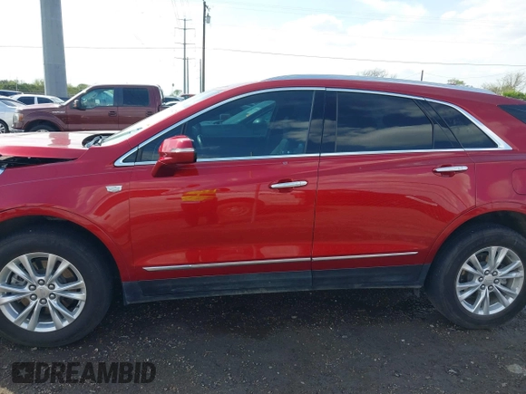 2021 Cadillac XT5 FWD Luxury with VIN 1GYKNAR45MZ125383, listed as a IAAI auction lot 41685947 with 64,997 mi miles. Bid and sale history available at carsss.com. Image 15.