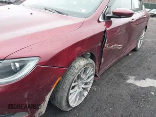 2015 Chrysler 200 Limited with VIN 1C3CCCAB3FN642928, listed as a IAAI auction lot 42005438 with 70,613 mi miles and . Bid and sale history available at DreamBid. Image 6.