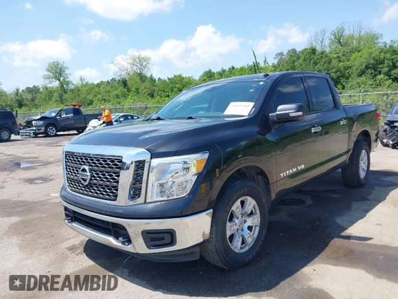 2018 Nissan Titan SV with VIN 1N6AA1EJ4JN529655, listed as a IAAI auction lot 42051405 with 153,599 mi miles and . Bid and sale history available at DreamBid. Image 17.
