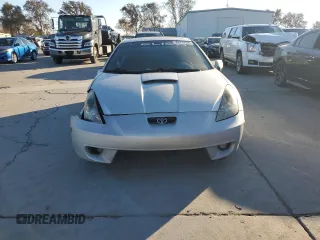 2000 Toyota Celica GT with VIN JTDDR32T1Y0046786, listed as a Copart auction lot 82707594 with 201,791 mi miles and Salvage Title. Bid and sale history available at carsss.com. Image 5.