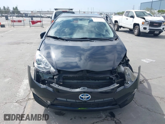 2014 Toyota Prius One z VIN JTDKDTB33E1569335, wystawiony jako IAAI lot #42483772 z przebiegiem Nie podano mil oraz . Historia ofert i sprzedaży dostępna na DreamBid. Obrazek 11.