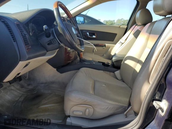 2003 Cadillac CTS with VIN 1G6DM57N030139878, listed as a Copart auction lot 66991484 with 187,869 mi miles and Salvage Title. Bid and sale history available at carsss.com. Image 7.