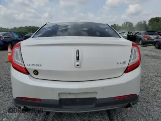 2013 Lincoln MKS with VIN 1LNHL9DK4DG612981, listed as a Copart auction lot 60701895 with 113,354 mi miles and Salvage title. Bid and sale history available at DreamBid. Image 6.