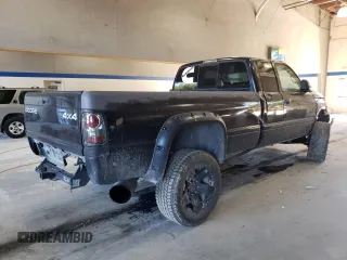 2002 Dodge Ram 2500 with VIN 3B7KF23C82M255391, listed as a Copart auction lot 73115584 with 216,242 mi miles and Salvage Title. Bid and sale history available at carsss.com. Image 3.