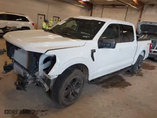 2023 Ford F-150 XL with VIN 1FTEW1EPXPFA42859, listed as a IAAI auction lot 41485089 with 30,911 mi miles. Bid and sale history available at carsss.com. Image 2.