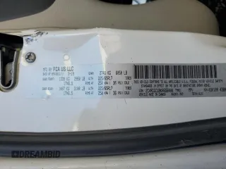 2019 Dodge Grand Caravan SXT with VIN 2C4RDGCG9KR656400, listed as a Copart auction lot 48322325 with Not Provided miles and Salvage Title. Bid and sale history available at DreamBid. Image 14.