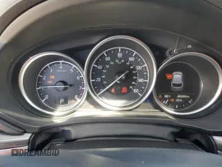 2018 Mazda CX-5 Grand Touring z VIN JM3KFBDM0J0399985, wystawiony jako Copart lot #54097665 z przebiegiem 45 344 mil mil oraz Szkoda całkowita • Salvage title. Historia ofert i sprzedaży dostępna na DreamBid. Obrazek 9.