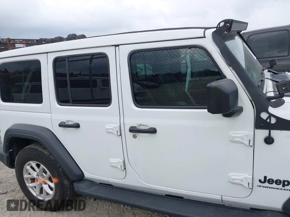 2023 Jeep Wrangler Willys z VIN 1C4HJXDG9PW545749, wystawiony jako IAAI lot #42307373 z przebiegiem 44 176 mil mil oraz . Historia ofert i sprzedaży dostępna na DreamBid. Obrazek 13.
