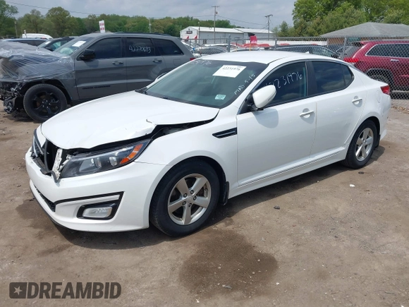 2015 Kia Optima LX z VIN KNAGM4A70F5649084, wystawiony jako IAAI lot #42231976 z przebiegiem 152 545 mil mil oraz . Historia ofert i sprzedaży dostępna na DreamBid. Obrazek 2.