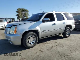 2010 GMC Yukon Denali with VIN 1GKUKEEF8AR170422, listed as a Copart auction lot 74334354 with 137,053 mi miles and Salvage Title. Bid and sale history available at carsss.com. Image 1.