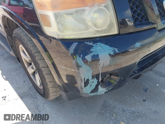 2012 Nissan Armada SV z VIN 5N1BA0ND7CN615987, wystawiony jako IAAI lot #41892790 z przebiegiem Nie podano mil oraz . Historia ofert i sprzedaży dostępna na DreamBid. Obrazek 6.