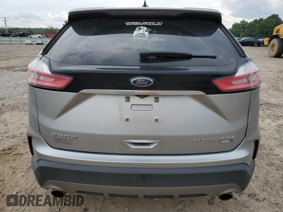 2020 Ford Edge Titanium с VIN 2FMPK4K94LBB35427, выставлен на аукционе Copart как лот 59682805 с пробегом 102 994 миль миль и Списание • Salvage title. История ставок и продаж доступна на DreamBid. Изображение 6.