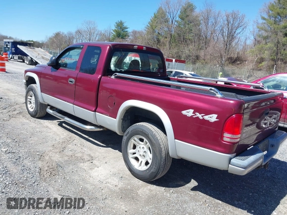 2003 Dodge Dakota SLT with VIN 1D7HG42N33S369870, listed as a IAAI auction lot 41826771 with 214,840 mi miles. Bid and sale history available at carsss.com. Image 3.