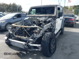 2018 Jeep Wrangler Sport S with VIN 1C4GJXAG0JW173936, listed as a IAAI auction lot 41070756 with Not Provided miles and . Bid and sale history available at DreamBid. Image 16.