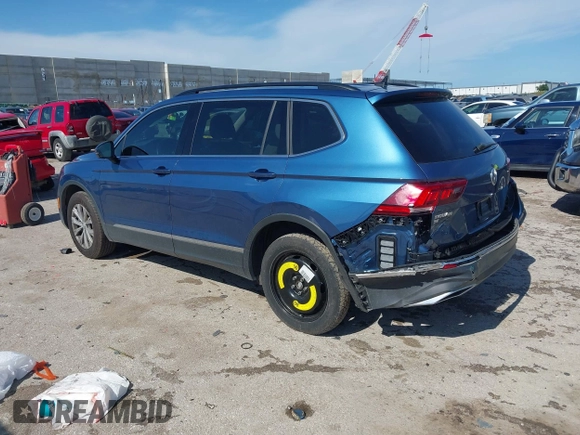 2018 Volkswagen Tiguan SEL z VIN 3VV3B7AX2JM155306, wystawiony jako IAAI lot #42457735 z przebiegiem 48 061 mil mil oraz . Historia ofert i sprzedaży dostępna na DreamBid. Obrazek 3.