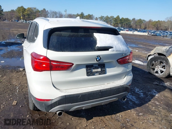 2017 BMW X1 xDrive28i with VIN WBXHT3Z36H4A52364, listed as a IAAI auction lot 41397667 with 61,960 mi miles. Bid and sale history available at carsss.com. Image 16.