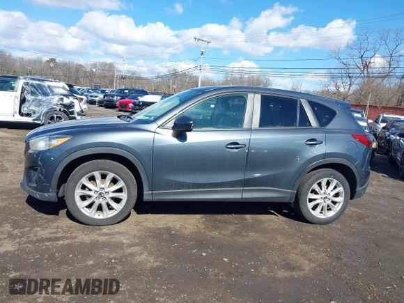 2013 Mazda CX-5 Grand Touring with VIN JM3KE4DE1D0164488, listed as a IAAI auction lot 41683326 with 129,989 mi miles. Bid and sale history available at carsss.com. Image 14.