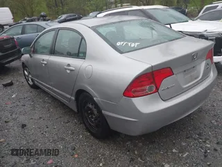 2006 Honda Civic LX with VIN 2HGFA16556H520894, listed as a IAAI auction lot 41963736 with 166,682 mi miles and . Bid and sale history available at DreamBid. Image 3.