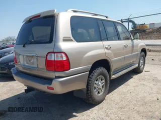 2001 Lexus LX 470 with VIN JTJHT00W613510736, listed as a IAAI auction lot 42005639 with 274,227 mi miles and . Bid and sale history available at carsss.com. Image 4.