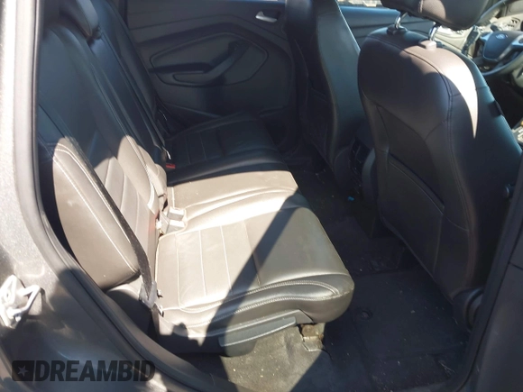 2014 Ford Escape Titanium with VIN 1FMCU9JX1EUB94776, listed as a IAAI auction lot 42063678 with 138,036 mi miles. Bid and sale history available at carsss.com. Image 8.