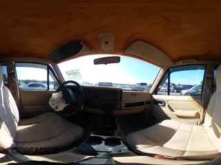 1995 Jeep Cherokee Sport z VIN 1J4FJ68S7SL623451, wystawiony jako IAAI lot #42581407 z przebiegiem 160 581 mil mil oraz . Historia ofert i sprzedaży dostępna na DreamBid. Obrazek 18.