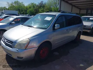 2006 Kia Sedona LX with VIN KNDMB233266036243, listed as a IAAI auction lot 41929441 with 202,851 mi miles. Bid and sale history available at carsss.com. Image 2.