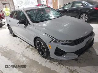 2022 Kia K5 GT-Line z VIN 5XXG64J21NG154551, wystawiony jako IAAI lot #42123004 z przebiegiem 14 829 mil mil oraz . Historia ofert i sprzedaży dostępna na DreamBid. Obrazek 1.