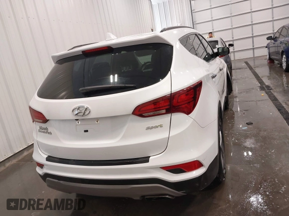 2017 Hyundai Santa Fe 2.4L z VIN 5XYZU3LBXHG444308, wystawiony jako IAAI lot #41685902 z przebiegiem 70 838 mil mil oraz . Historia ofert i sprzedaży dostępna na DreamBid. Obrazek 16.