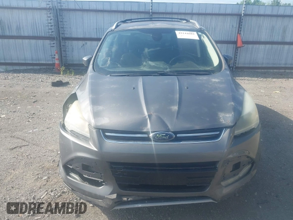 2013 Ford Escape Titanium with VIN 1FMCU0J92DUB36428, listed as a IAAI auction lot 42144682 with 263,600 mi miles and . Bid and sale history available at carsss.com. Image 13.