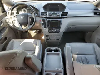 2014 Honda Odyssey Touring with VIN 5FNRL5H94EB094357, listed as a Copart auction lot 53930635 with 210,448 mi miles and Salvage Title. Bid and sale history available at carsss.com. Image 8.