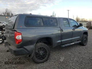 2015 Toyota Tundra 4WD Truck SR with VIN 5TFUM5F15FX063047, listed as a Copart auction lot 87409124 with 122,877 mi miles and Salvage Title. Bid and sale history available at carsss.com. Image 3.