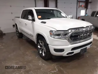 2020 Ram 1500 Limited with VIN 1C6SRFHT7LN319636, listed as a IAAI auction lot 41288661 with 107,029 mi miles. Bid and sale history available at carsss.com. Image 1.