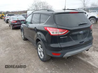 2016 Ford Escape SE with VIN 1FMCU9GX0GUC86844, listed as a IAAI auction lot 42046081 with 95,319 mi miles. Bid and sale history available at carsss.com. Image 3.