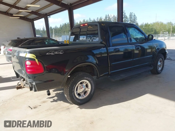 2002 Ford F-150 XLT with VIN 1FTRW08L92KD75087, listed as a IAAI auction lot 41960331 with 1 mi miles. Bid and sale history available at carsss.com. Image 4.