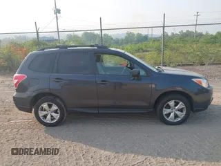 2014 Subaru Forester Premium z VIN JF2SJAEC4EH467916, wystawiony jako IAAI lot #42417753 z przebiegiem 105 849 mil mil oraz . Historia ofert i sprzedaży dostępna na DreamBid. Obrazek 13.
