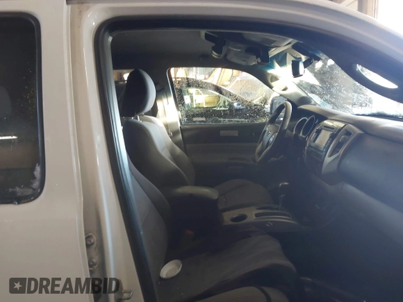 2013 Toyota Tacoma with VIN 3TMLU4EN2DM104490, listed as a IAAI auction lot 41636616 with 153,036 mi miles and . Bid and sale history available at DreamBid. Image 5.