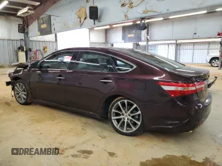 2014 Toyota Avalon Limited with VIN 4T1BK1EB7EU105830, listed as a Copart auction lot 88096505 with 106,626 mi miles and Salvage Title. Bid and sale history available at carsss.com. Image 2.