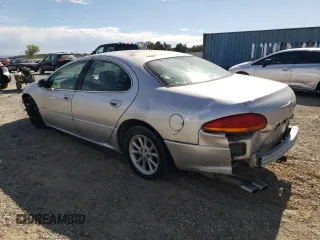 2001 Chrysler LHS z VIN 2C3HC56G11H643759, wystawiony jako Copart lot #70924974 z przebiegiem 124 263 mil mil oraz Tytuł czysty. Historia ofert i sprzedaży dostępna na DreamBid. Obrazek 2.