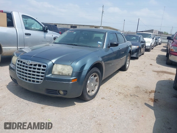 2006 Chrysler 300 Touring with VIN 2C3KA53G16H151319, listed as a IAAI auction lot 41917412 with 245,741 mi miles. Bid and sale history available at carsss.com. Image 2.