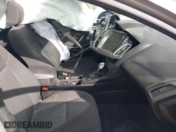 2015 Ford Focus SE with VIN 1FADP3F29FL292655, listed as a IAAI auction lot 41090945 with 106,060 mi miles. Bid and sale history available at carsss.com. Image 5.