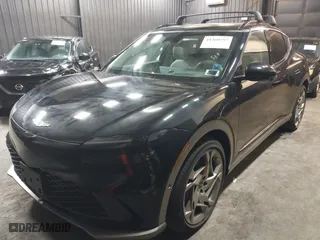 2023 Genesis GV60 Performance with VIN KMUKEDTB2PU010964, listed as a IAAI auction lot 41260757 with 19,472 mi miles. Bid and sale history available at carsss.com. Image 2.