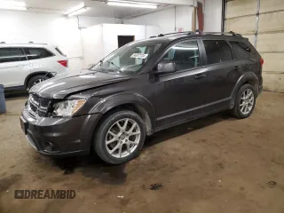 2015 Dodge Journey SXT with VIN 3C4PDCCG9FT722284, listed as a Copart auction lot 84937724 with 210,747 mi miles and Salvage title. Bid and sale history available at DreamBid. Image 1.