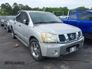 2005 Nissan Titan XE with VIN 1N6AA07A95N511746, listed as a IAAI auction lot 42190947 with 216,306 mi miles and . Bid and sale history available at DreamBid. Image 1.
