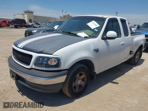 1999 Ford F-150 with VIN 1FTRX07W0XKA01385, listed as a IAAI auction lot 42247809 with 147,105 mi miles and . Bid and sale history available at DreamBid. Image 2.