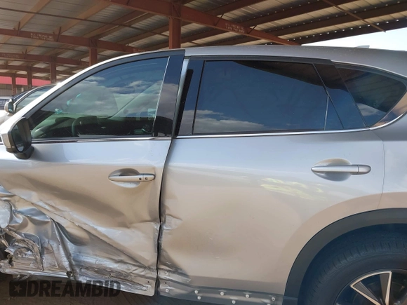 2017 Mazda CX-5 Grand Touring with VIN JM3KFADL3H0121772, listed as a IAAI auction lot 41935183 with 48,869 mi miles and . Bid and sale history available at carsss.com. Image 14.